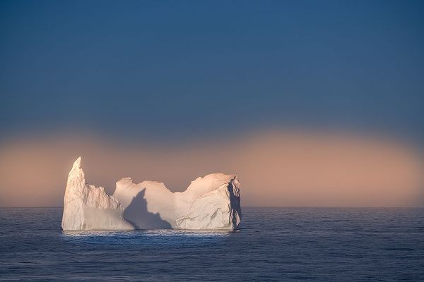 Antarctica-South Georgia Island Lone iceberg and sunset